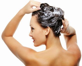 washing hair with solid shampoo bar